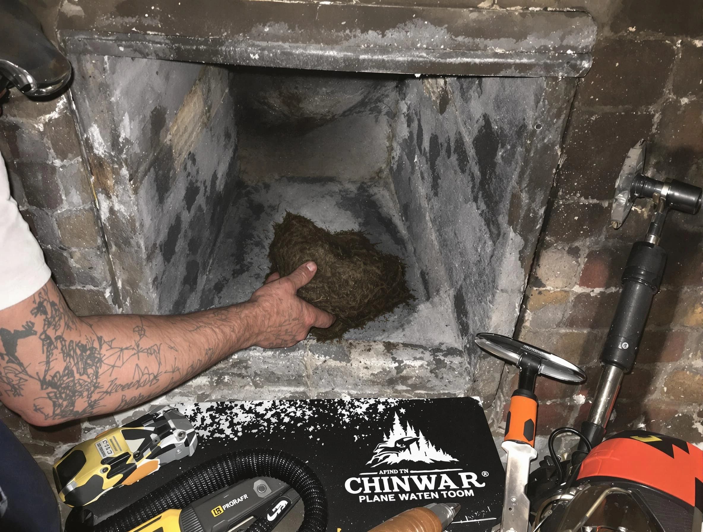Mountain Park Chimney Sweep safely removing debris and screening chimney in Mountain Park, GA